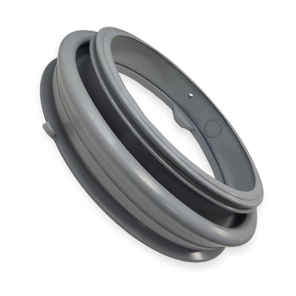 Pesukoneen harmaa kauluskumi sivuprofiilista